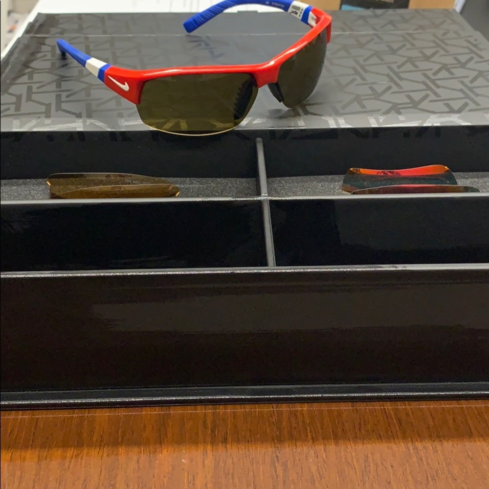 Nike show X2 Sunglasses with four extra lenses